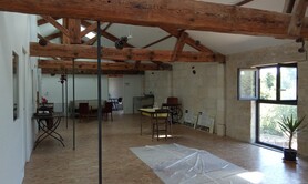 Location d'ateliers pour artisans ou artistes dans un bâtime